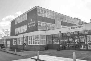 black and white version of south Wirral high school building
