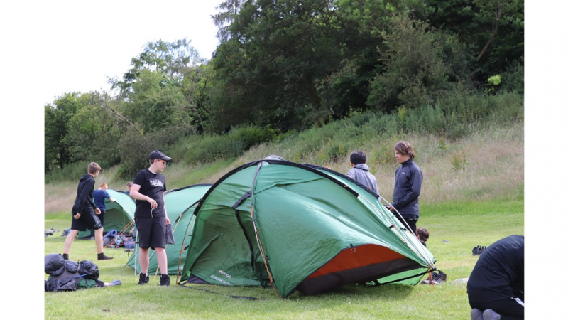 South Wirral students taking putting up tents at duke of Edinburgh