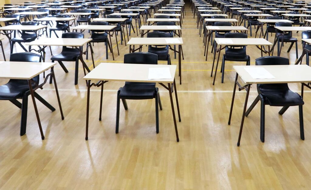 desks set up at south wirral high school ready for a level results day
