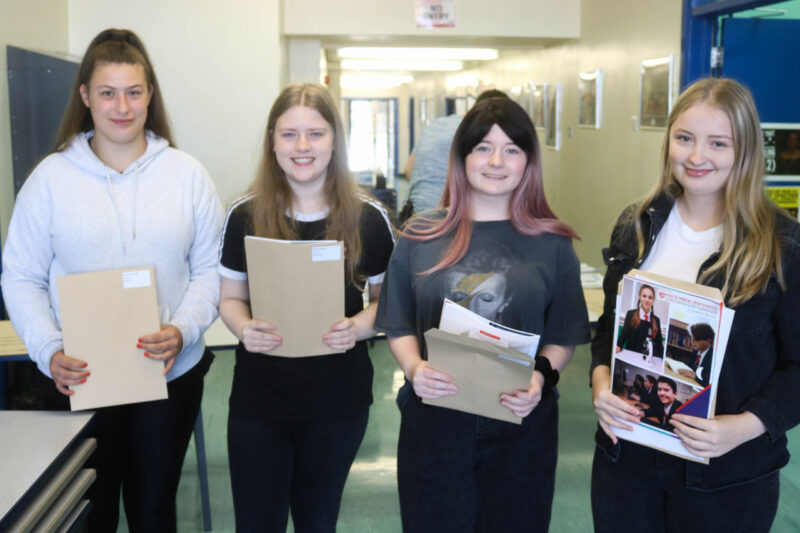 students celebrating GCSE Exam results