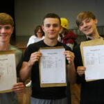 students collecting their GCSE results at south Wirral high school