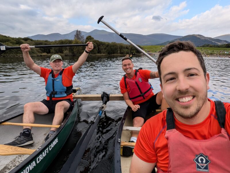 South Wirral high school staff in a canoe taking part in the race the sun challenge for charity